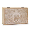 Large rectangular wooden box with a carved buddha face and mandala pattern in light beige wood tones and whitewash finish