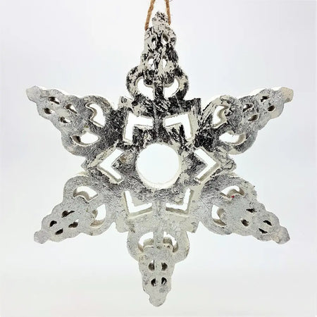 Large silver wooden snowflake hanging ornament with intricate carving rustic texture and twine string