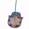 Large soapstone incense holder shaped like a colorful hand with 7 chakras and hamsa symbols in a rainbow finish
