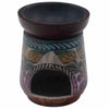 Hand carved soapstone oil burner with dark brown bowl and teal gold purple floral patterns shaped like an elephant