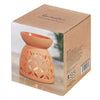 Large terracotta oil burner with intricate leaf-patterned cutouts for home decor and aromatherapy use