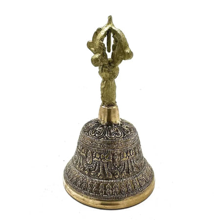 Large brass tingsha bell with intricate engraved patterns and a decorative handle for Tibetan rituals
