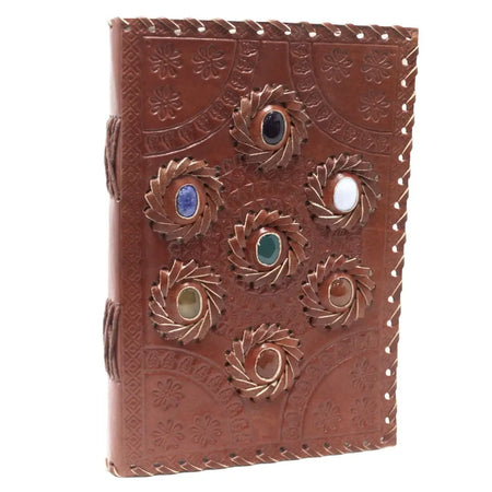 Brown leather notebook with embossed floral patterns and six chakra stones in swirling metal settings 9x6 inches