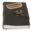 Dark brown leather notebook with brass clasp and embossed commission patch, sized 7 by 5 inches for writing and notes