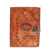 Tan leather notebook featuring stitched evil eye design and metal clasp for secure closure and stylish use