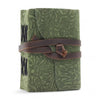 Leather notebook with green maze pattern embossed olive green leather cover and brown leather strap binding