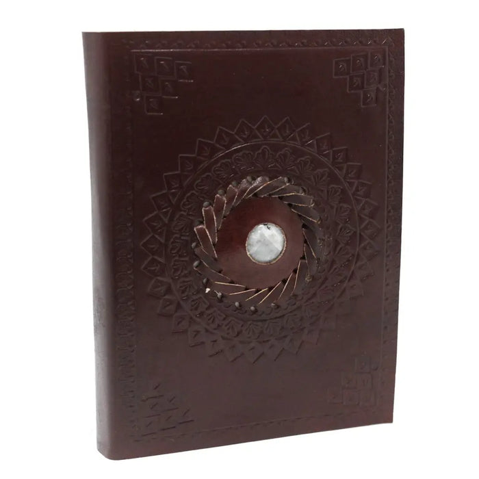 Brown leather notebook with embossed mandala design and central circular embellishment 7 by 5 inches