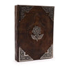 Dark brown leather notebook with silver embossed floral design and ornate corner accents measuring 10 by 7 inches