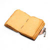 A leather notebook with a leather cover, aged yellow pages, decorative clasp, and deckled edges for untold stories