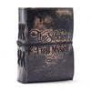 Black leather notebook with distressed finish and embossed text the stories i tell myself deckled edges 5x3½ inches