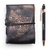 Black leather notebook with embossed copper text the stories i tell myself and black cord binding deckled edges