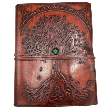 Brown leather notebook with embossed tree of life design and green gemstone on leather cover 8 by 6 inches