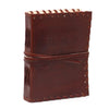 Brown leather notebook with stitched edges and embossed text measuring six by four inches for writing thoughts