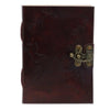 Dark brown leather notebook with embossed world map design and brass latch measuring 7 by 5 inches