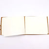 Brown leather sketchbook with cream blank pages featuring a golden tree design 9 by 7 inches