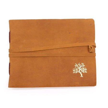Tan leather sketchbook with a golden tree design and matching strap for drawing or journaling 9 by 7 inches