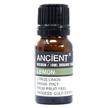 A small amber glass bottle with a black cap labeled ancient wisdom lemon organic essential oil 10ml allergen declarations