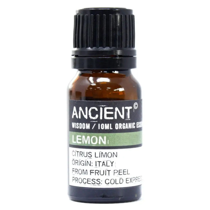 A small amber glass bottle with a black cap labeled ancient wisdom lemon organic essential oil 10ml allergen declarations