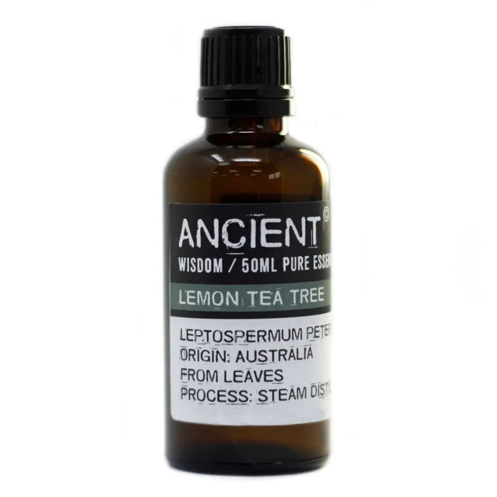 A dark amber glass bottle of lemon tea tree essential oil 50ml with a black ribbed cap and allergen declarations label