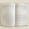 Open light blue velvet notebook with lined pages and soft blue velvet cover for writing and notes