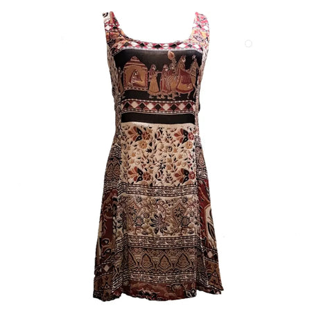A sleeveless light cotton indian dress with earthy brown beige and black traditional indian print patterns