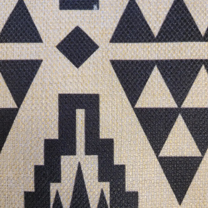 Beige and black geometric patterned woven textile on a lightly padded aztec print cushion cover for standard cushions