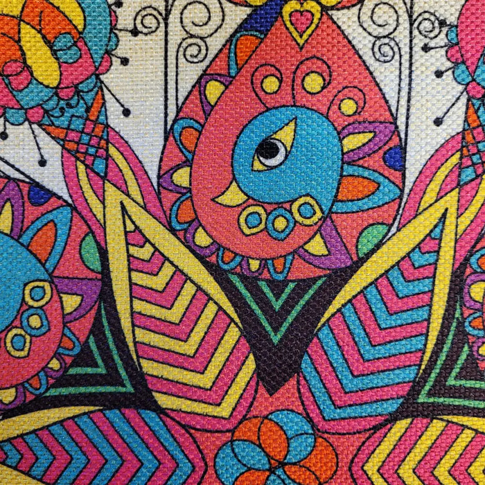 Lightly padded peacock print cushion cover with vibrant embroidered blue bird and colorful geometric patterns on fabric