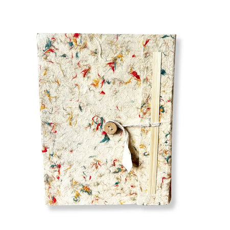 A lokta cotton notebook with mixed colour fibres, off-white textured cover, wooden button, and twine closure