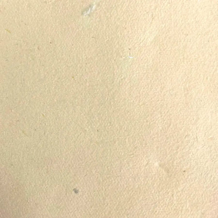 Beige textured lokta craft paper sheet showing natural fibers used for gift wrapping and lokta paper crafts