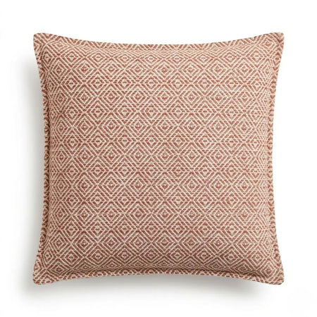 A square cushion cover with a woven geometric pattern in muted terracotta and cream tones called burgundy squares