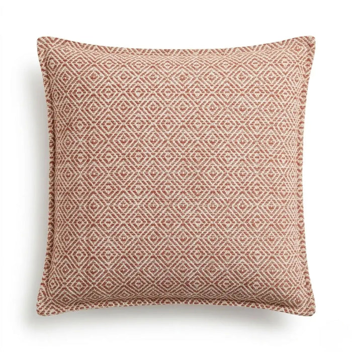 A square cushion cover with a woven geometric pattern in muted terracotta and cream tones called burgundy squares