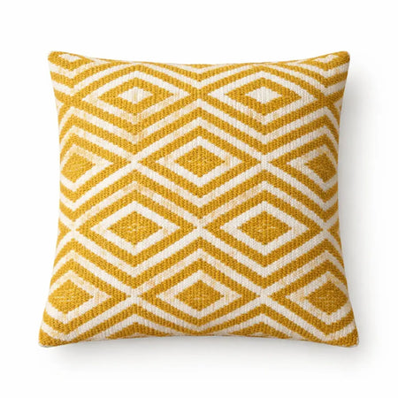 A square cushion cover with a woven geometric pattern in mustard yellow and cream made from soft fabric