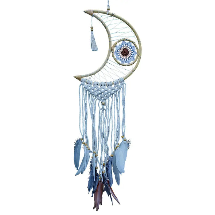 A light blue macrame dreamcatcher moon with a dark brown woven center and blue purple feathers hanging below