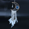 Macrame dreamcatcher moon shaped with white woven macrame, blue crocheted eye, and white feathers hanging down