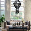 Black cotton macrame chandelier with tasseled fringe made of cotton rope for hanging lighting decor