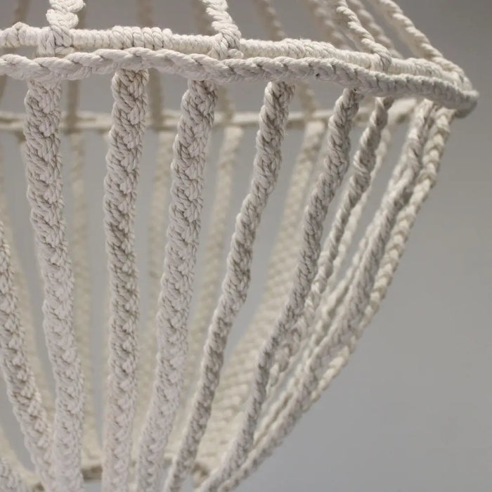 A delicate off-white macrame large drop cotton rope chandelier with an intricate woven pattern and cotton rope material