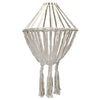 A cream-colored macrame large drop cotton rope chandelier with braided cotton rope and tassels hanging indoors