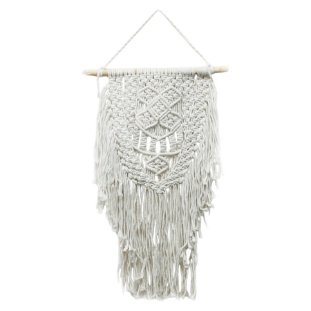 A delicate off-white macrame wall hanging with intricate geometric patterns and long flowing fringe