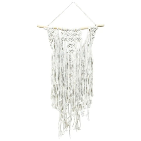 White macrame wall hanging with intricate knotwork on wooden dowel called the wedding blessing design