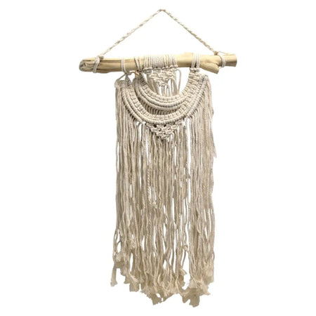 Cream-colored macrame wall hanging with two wave patterns, natural wood dowel, and rope fringe detail