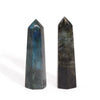 Two polished madagascar labradorite obelisks showing blue iridescence and dark gray with greenish hues weighing 50-65gm
