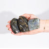 Three polished madagascar labradorite tomb stones 5-7cm with blue green iridescent sheen weighing 80-100gm each