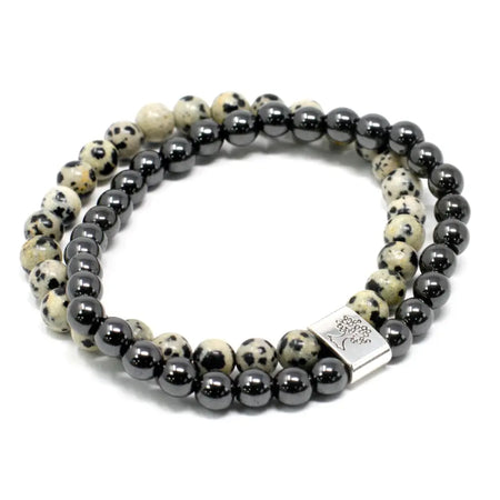 A double-strand magnetic gemstone bracelet with dalmatian jasper and black beads and a silver tree clasp