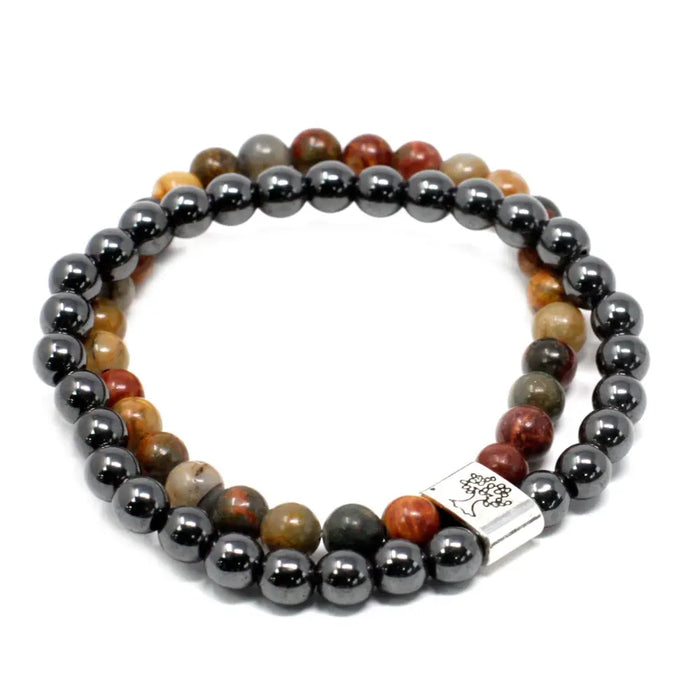 A double-strand magnetic gemstone bracelet with black hematite and earthy picasso jasper beads and a silver tree clasp
