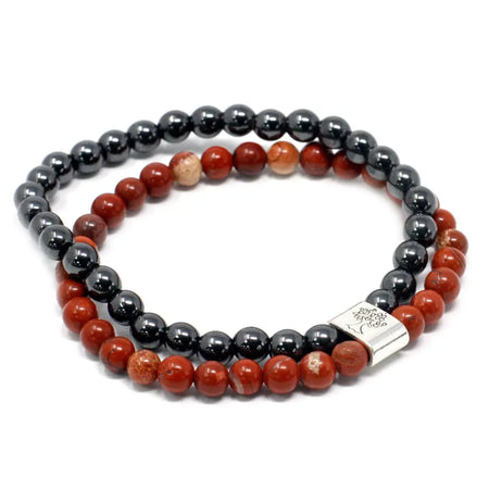 Magnetic gemstone bracelet with red and black beads and a silver tree of life clasp