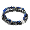 A double-strand magnetic gemstone bracelet with blue lapis lazuli and black hematite beads and a silver floral clasp