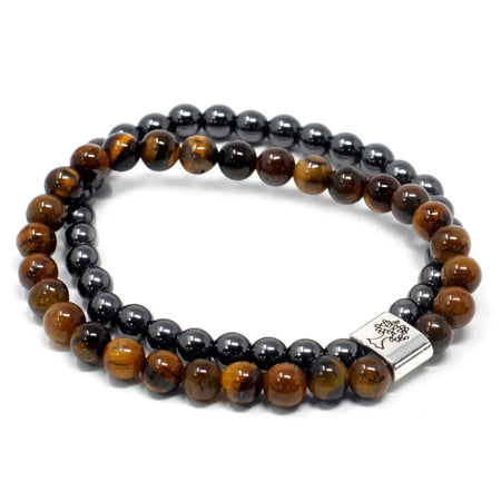 A magnetic gemstone bracelet with double strands of tiger eye and hematite beads and a silver tree clasp