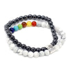 Magnetic gemstone bracelet with black hematite white howlite chakra stones and silver-toned clasp with tree design