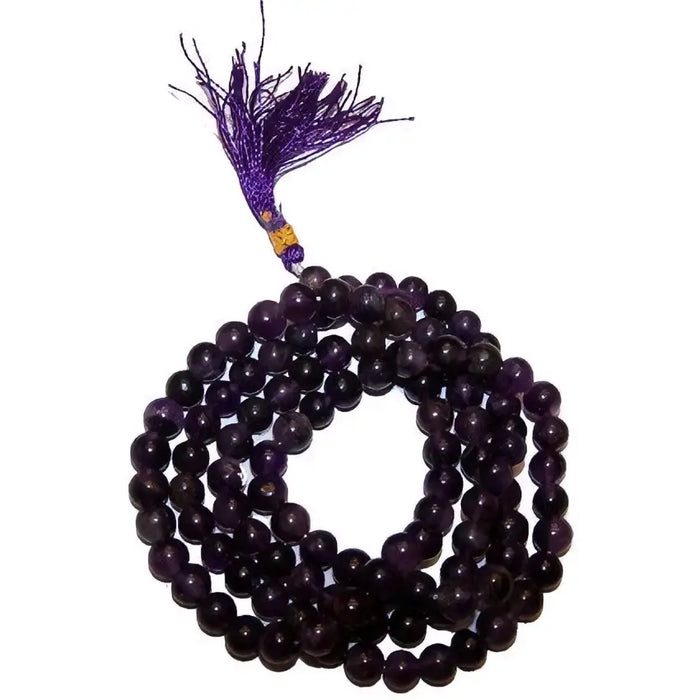 A deep purple amethyst mala beads with matching tassel shown alongside black agate mala beads product