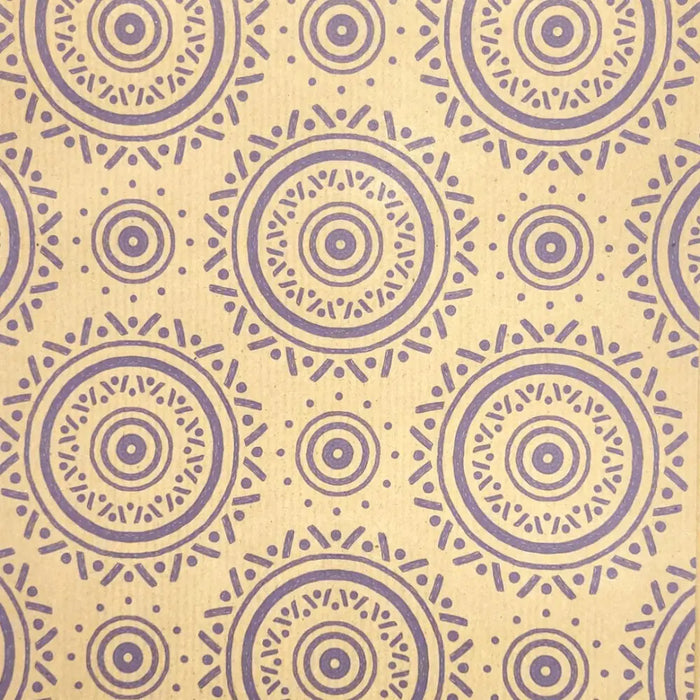 Mandala recycled kraft gift wrap showing purple circular patterns on textured light beige kraft paper sheet